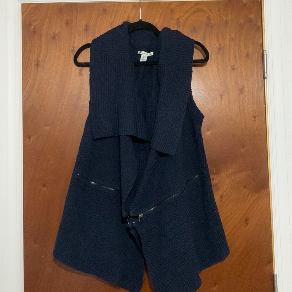 Navy blue open faced sleeveless vest